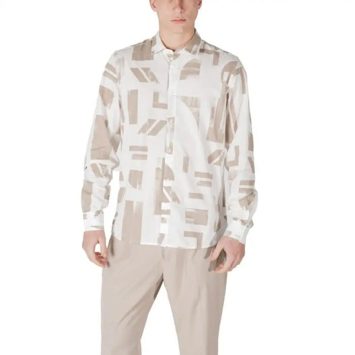 Man in patterned long-sleeve shirt and khaki pants wearing Antony Morato Blue Hooded Shirt