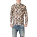 Man wearing Gianni Lupo White Floral Mandarin Collar Shirt with patterned sleeves and ripped jeans