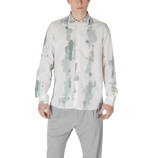 Man wearing Antony Morato Long Sleeve Classic Buttoned Shirt with gray pants