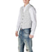 Man wearing striped vest and ripped jeans from Men Vest And Jeans Collection
