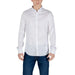 Man in white button-down shirt and blue jeans featuring Armani Exchange Mens Long White Button Shirt