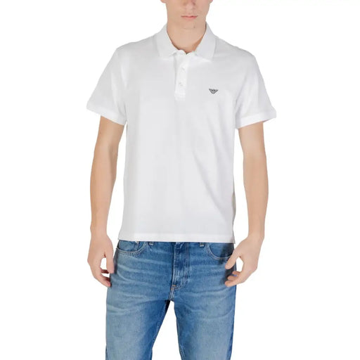 Man wearing a white polo shirt and blue jeans in the Men’s White Polo Shirt and Blue Jeans product image
