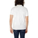 Man modeling Peuterey Men Polo in white, showcasing Peuterey’s style.