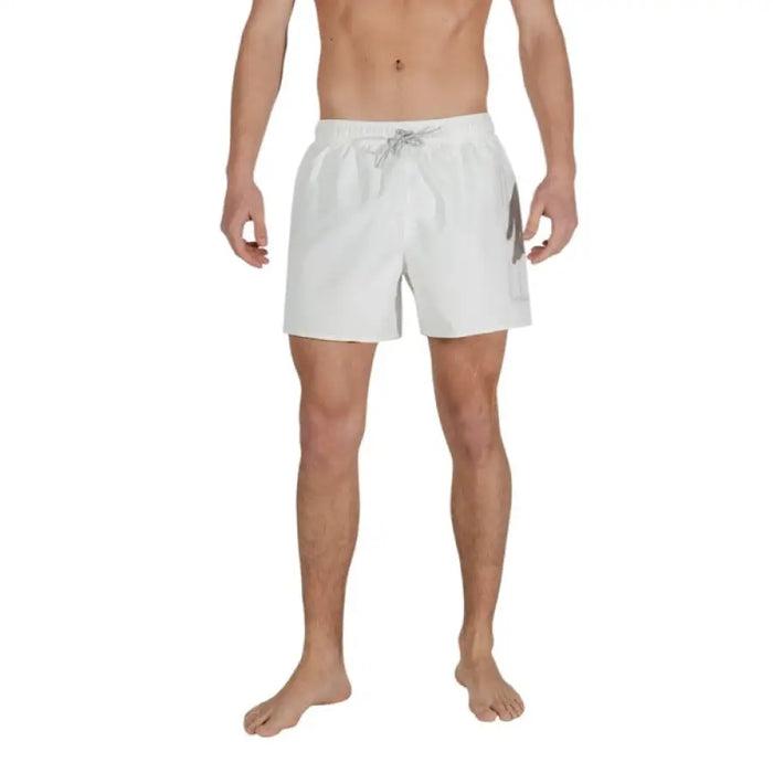 Man in white swim trunks showcasing Ea7 Men Swimwear Spring Summer Blue Plain Laces