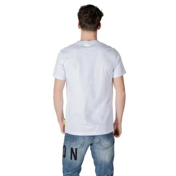 Man wearing Icon Men White Cotton Round Neck T-Shirt with blue jeans