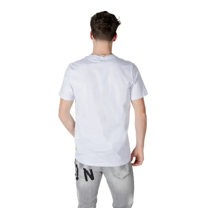 Man in white t-shirt and gray jeans showcasing Icon Men White Short Cotton Underwear
