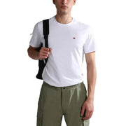 Man in white Napapijri cotton T-shirt and green cargo pants showcasing casual style