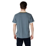 Man wearing a gray short-sleeved shirt from Napapijri Men Green Cotton Polo Shirt