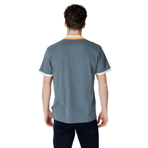 Man wearing a gray short-sleeved shirt from Napapijri Men Green Cotton Polo Shirt