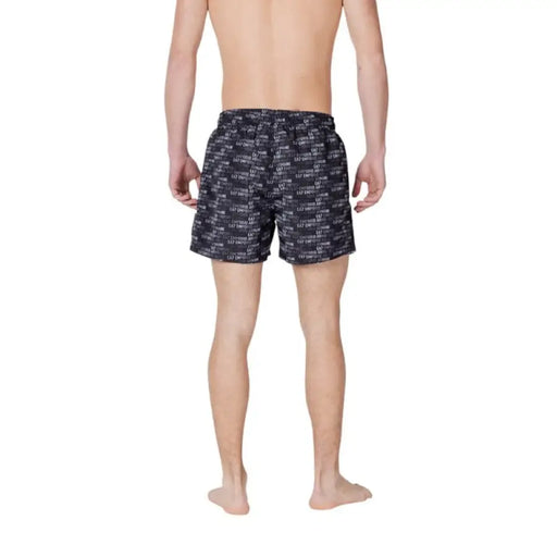Man’s patterned boxer shorts from EA7 Men Swimwear Black Print Spring Summer collection