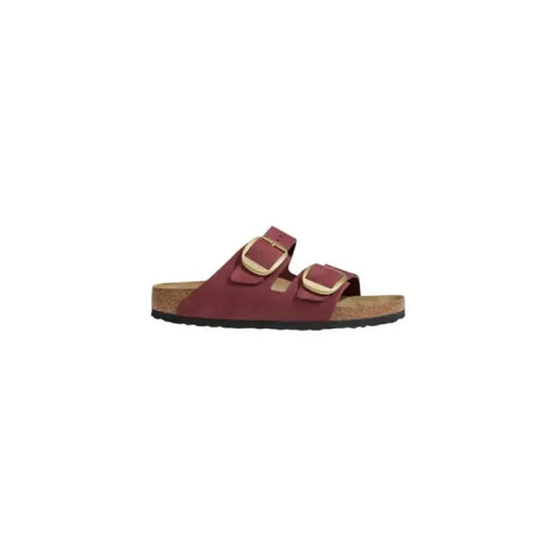 Maroon sandals with gold buckles from Birkenstock Women’s Leather Slippers in Brown