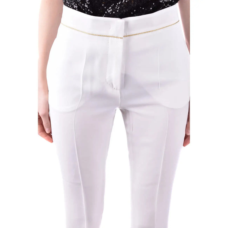 MaxMara white women’s high-waisted trousers with gold-trimmed waistband and sleek tailored fit for spring summer