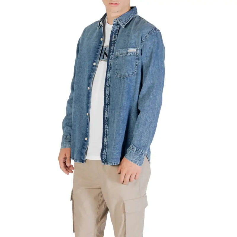 Men blue denim long sleeved shirt with classic collar and chest pocket made of durable denim fabric