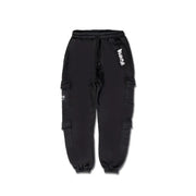 Men’s black cotton cargo pants with laces and multiple pockets featuring white graffiti-style lettering on the thigh