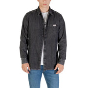 Men’s gray denim long sleeve shirt with dark gray fabric button-up front chest pocket and subtle stitching details