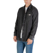 Men’s gray denim long sleeve shirt with black distressed denim button-up front and chest pocket