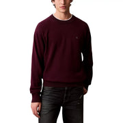 Mens gray long sleeved sweater in maroon crewneck design with white ribbed collar and subtle chest embroidery