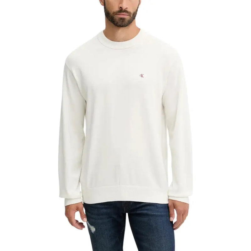 White calvin klein long-sleeve crewneck sweater with small logo on chest.
