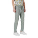 Men’s light green drawstring trousers displayed in a product image