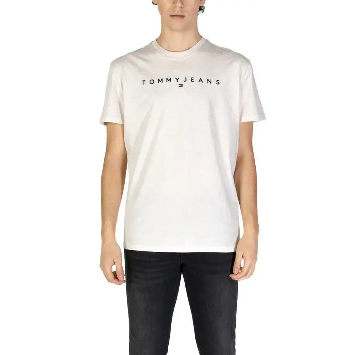 Mens White Tommy Jeans Short Sleeve T Shirt displayed in a retail product image