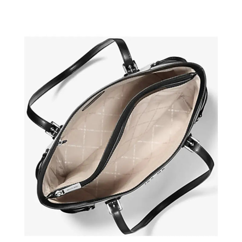 Michael Kors black leather slip on handbag with beige quilted interior and silver toned hardware with pockets