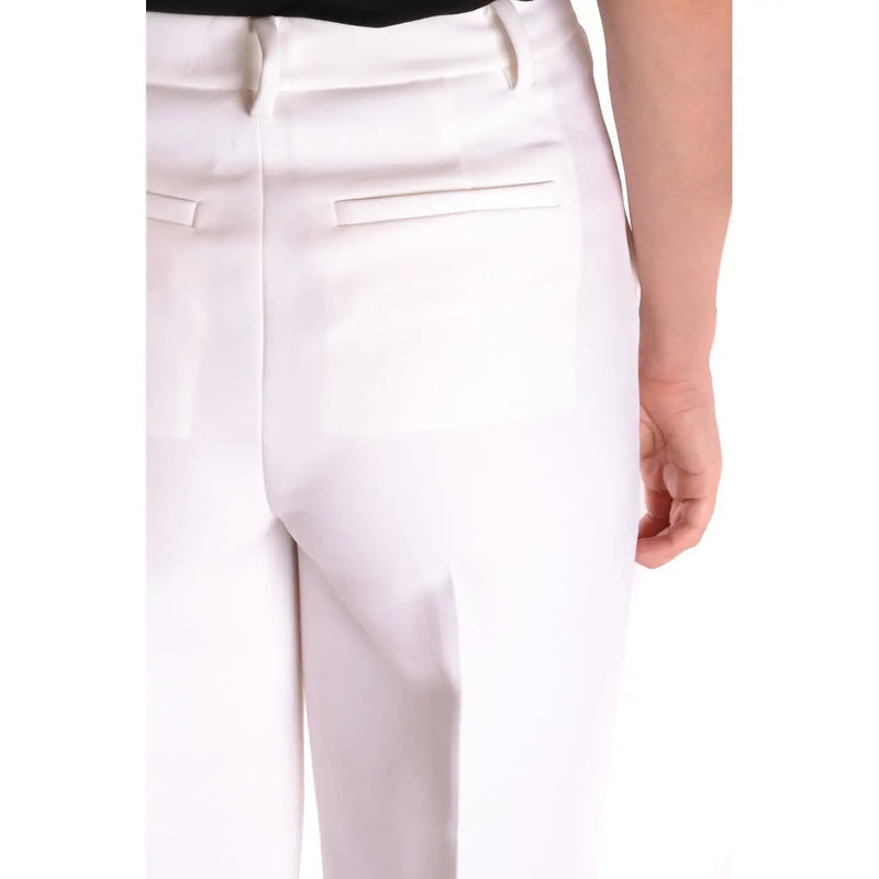 Pantalon blanc stretch taille haute pour femme Michael Kors, fermeture éclair et boutons, finitions soignées.