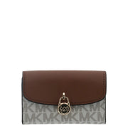 Portefeuille femme Michael Kors en cuir marron avec fermoir doré et poche à motif monogramme gris et blanc