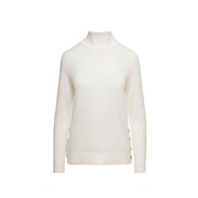 Pull à col roulé en laine crème pour femme Michael Kors, orné de boutons dorés le long des coutures latérales.
