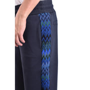 Pantalon Missoni Homme en viscose bleu marine foncé, coupe classique, orné d'une bande latérale à motif zigzag bleu et vert vif.