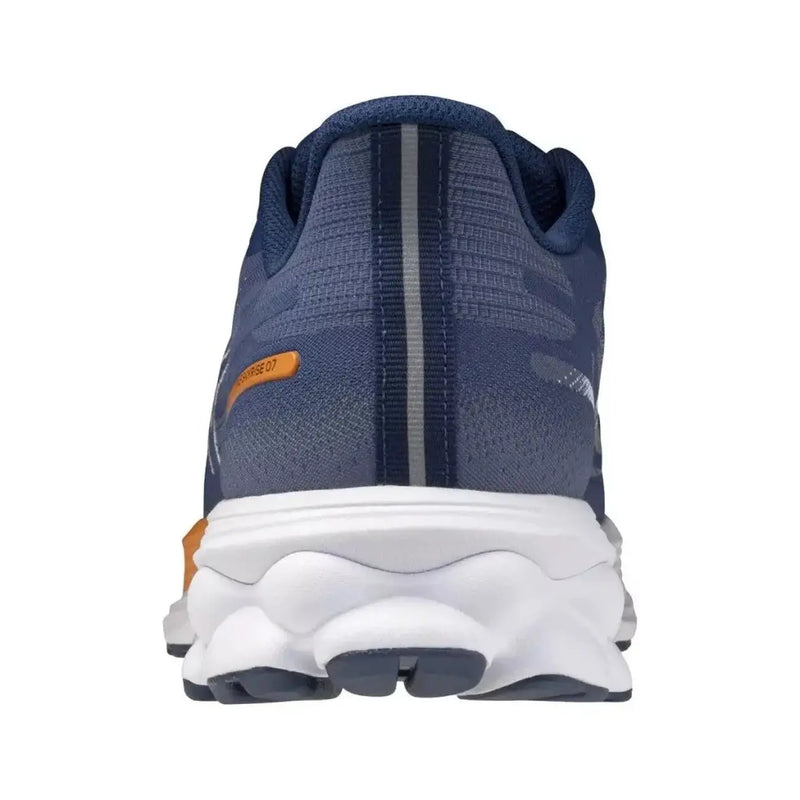 Chaussure de running Mizuno Wave Inspire 20 pour homme, bleu marine, avec des touches de blanc et d'orange pour une performance sportive.