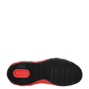 Black and red nike basketball shoe with textured sole design.