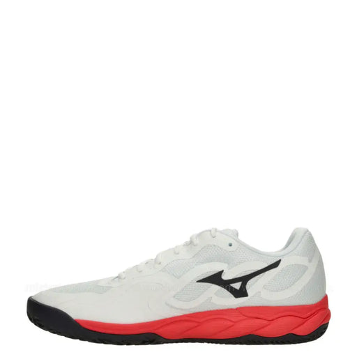 White and red mizuno volleyball shoe with black accents.