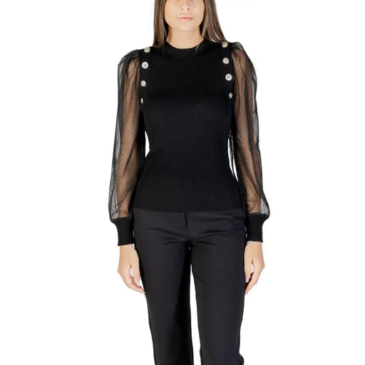 Black long-sleeved blouse with sheer puffed sleeves and decorative buttons by Morgan De Toi