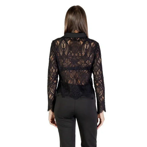 Women wearing Morgan De Toi black long-sleeve lace blouse with collar and fitted trousers