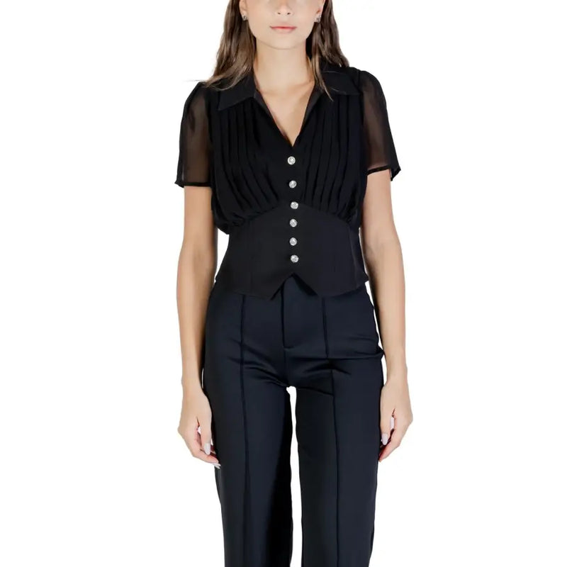 Women’s black short-sleeved collared blouse with ruched bodice and decorative buttons paired with matching black trousers for Fall Winter