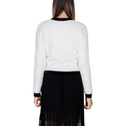Women’s white fuzzy V-neck long knit cardigan with black trim for fall winter fashion