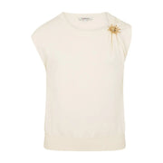 Morgan De Toi pull beige sans manches pour femme top avec une broche soleil dorée couleur crème sur l'épaule