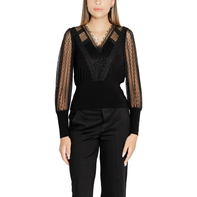 Women’s black long-sleeve V-neck knitwear with sheer polka dot sleeves and lace details