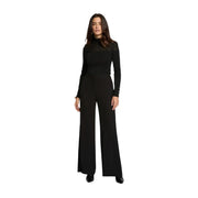 Morgan de toi Combinaison noire en polyester pour femme, avec col montant et détails en dentelle aux épaules et aux poignets.