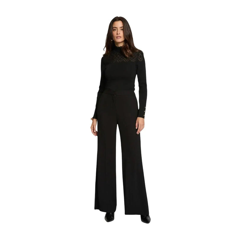 Morgan de toi Combinaison noire en polyester pour femme, avec col montant et détails en dentelle aux épaules et aux poignets.