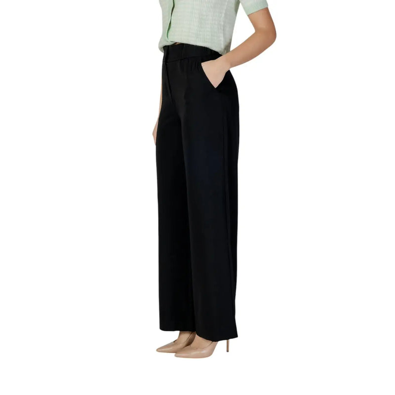 Morgan De Toi Pantalon noir en polyester pour femme, coupe ample et ajustée, avec de subtils détails de coutures latérales.