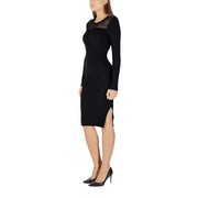 Long black ribbed knit dress with mesh detail and side slit from Morgan De Toi