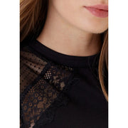 Morgan De Toi femme sans manches col rond top noir avec une superposition de dentelle noire transparente et de délicats motifs floraux