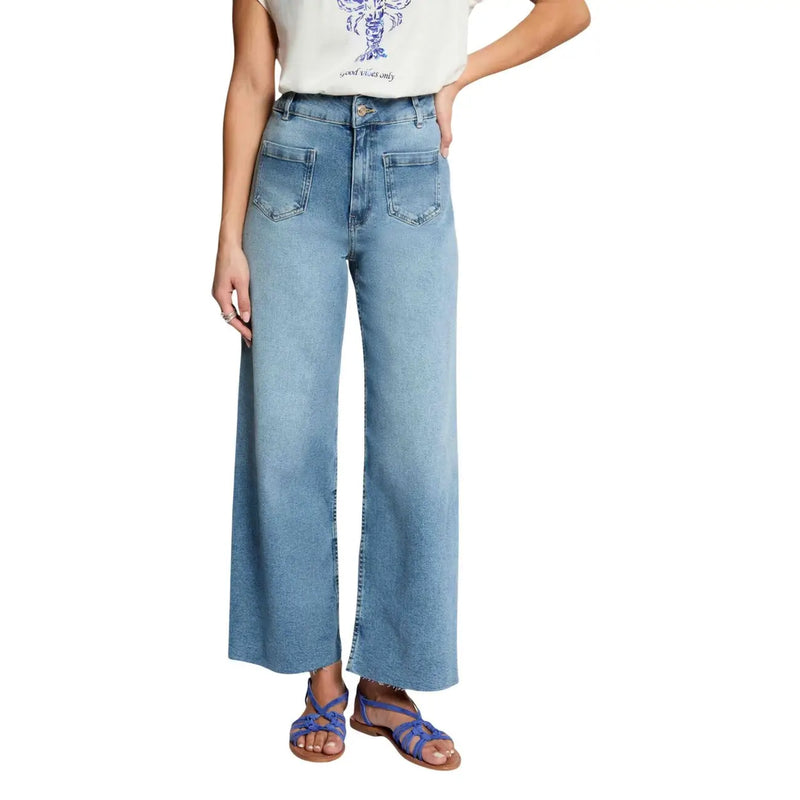 Jean Morgan bleu marine pour femme, en coton délavé clair, coupe large, taille haute et ourlets effilochés effet usé.
