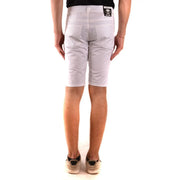 Moschino Short en coton blanc pour femme avec écusson noir de la marque à l'arrière de la ceinture, vue de dos