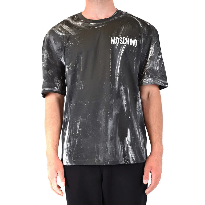 Noir Moschino hommes t-shirt vêtements décontractés en coton avec un motif abstrait brillant blanc et gris à coups de pinceau