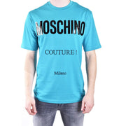 Turquoise Moschino men t-shirt featuring bold black lettering and Milano print on the front in cotton material