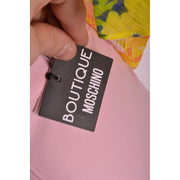 Boutique rectangulaire noire Moschino Pantalon rose pour femme, de fabrication italienne, avec étiquette blanche, collection printemps-été.