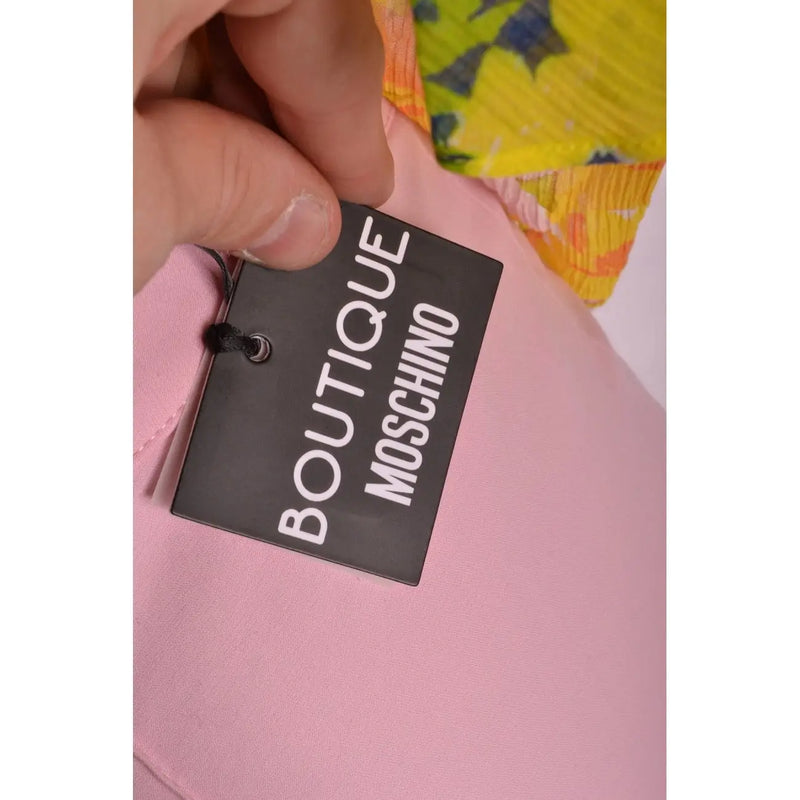 Boutique rectangulaire noire Moschino Pantalon rose pour femme, de fabrication italienne, avec étiquette blanche, collection printemps-été.