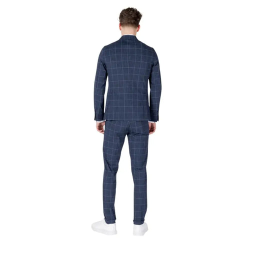 Men’s navy blue windowpane check cotton suit with low V neck and lapel collar